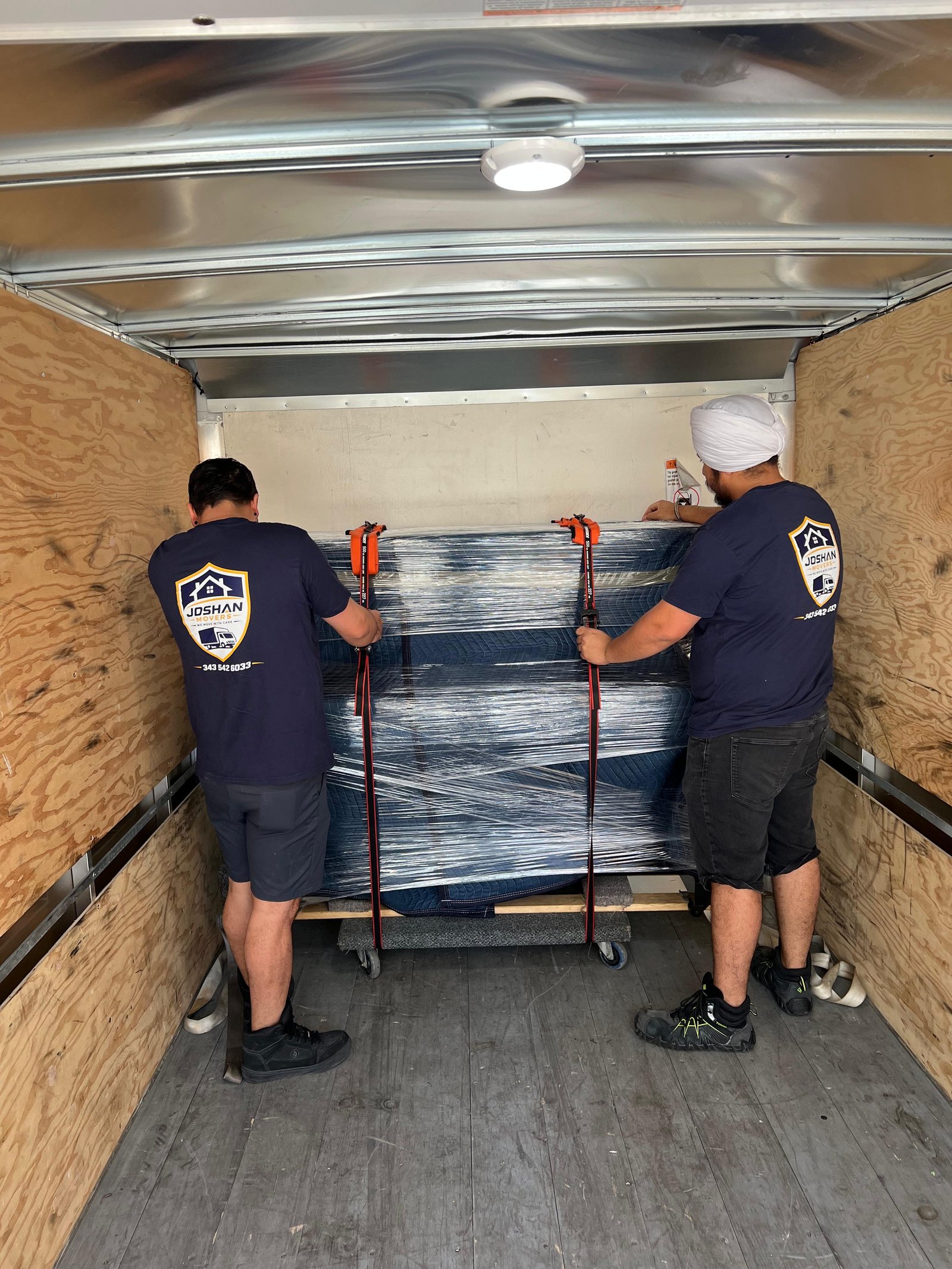 Movers carrying boxes